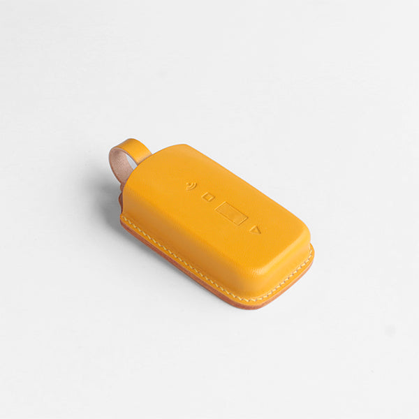 Handmade leather car key holder for Rolls-Royce Phantom, luxury protective cover with premium stitching.