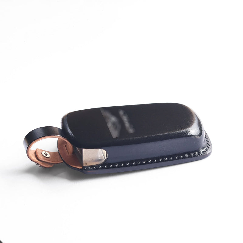 ​​Alt Text:​​ Leather key cover for Aston Martin Vantage with precise button access
