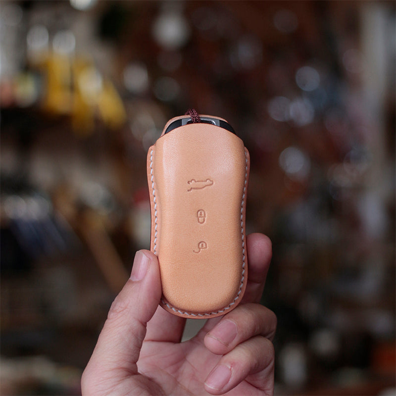 Luxury leather key fob cover for Porsche owners seeking minimalist style