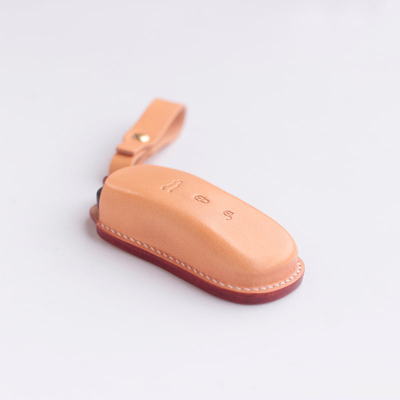 Minimalist veg-tan leather key skin protector custom fit for Porsche
