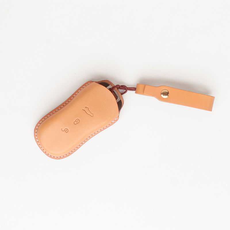 Handcrafted vegetable tanned leather key cover for Porsche Cayenne Macan 911 by TANGEAR