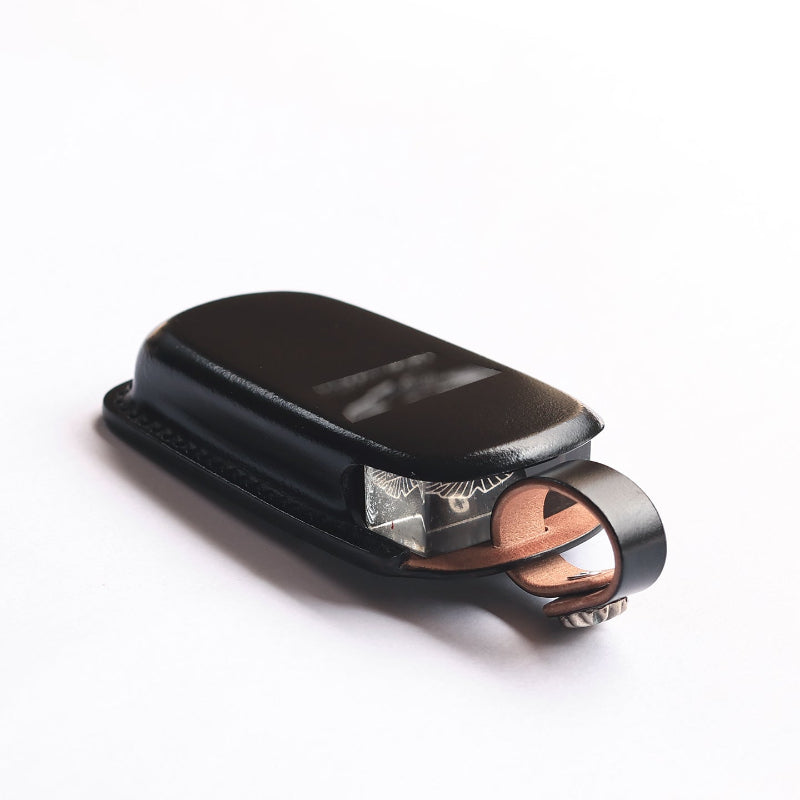 Slim profile of the handmade leather key holder for an Aston Martin DB9.