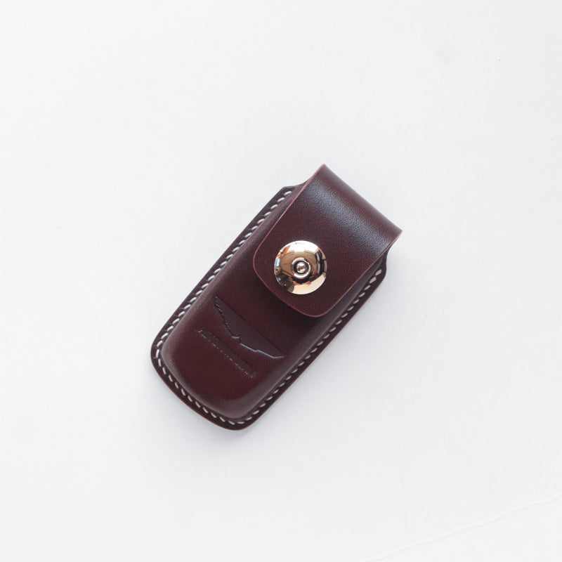 Track-focused key case for Vulcan – aerospace-grade titanium buckles