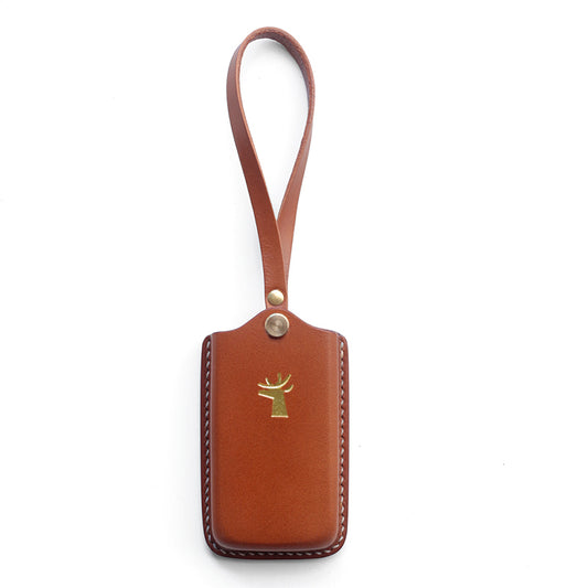Hand-stitched vegetable-tanned leather key case for Ferrari Roma – Slim-fit molded design
