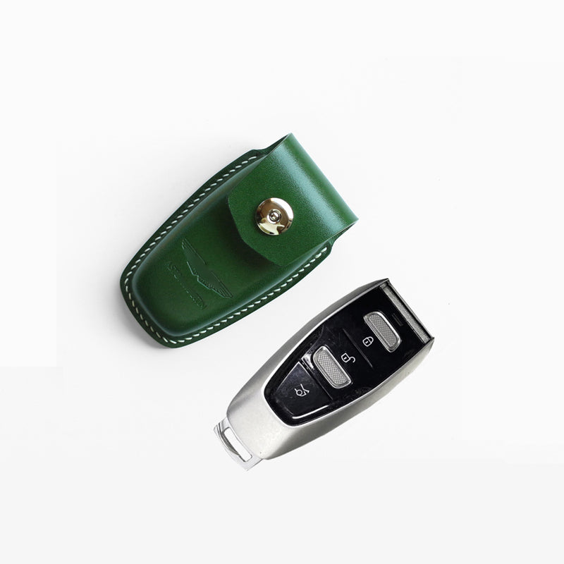 High-quality full-grain leather texture on Aston Martin DBX key fob case