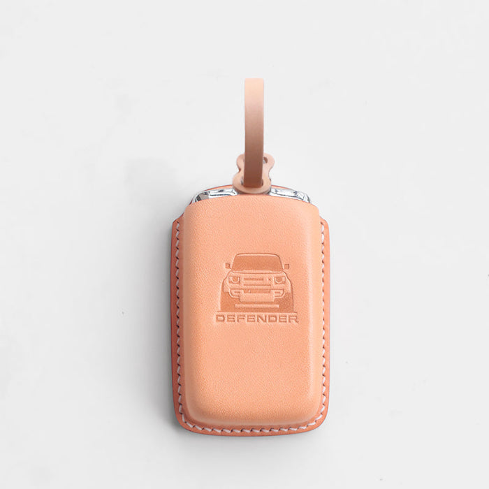 Handmade leather key cover for Land Rover Defender – close-up stitching detail