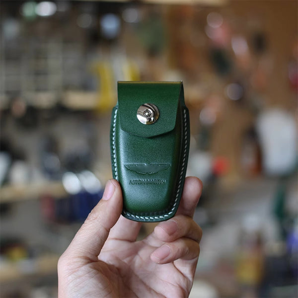 Close-up of magnetic closure on premium Aston Martin DBX leather key holder
