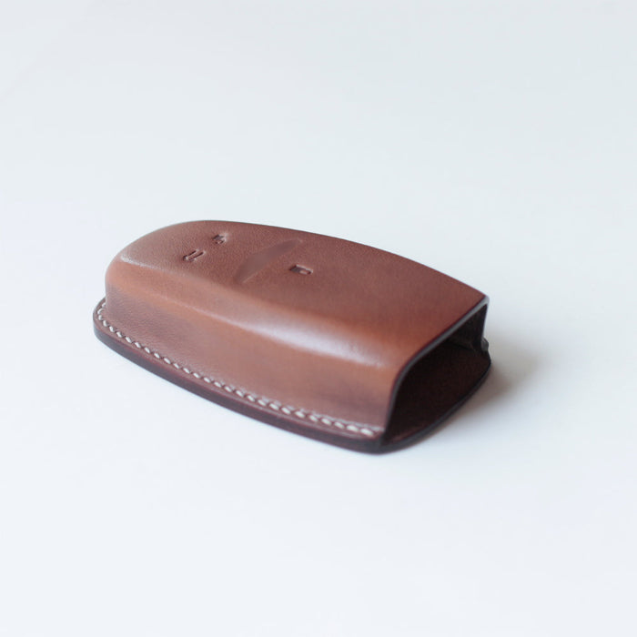 Minimalist leather key sheath designed for Aston Martin DB11 – handcrafted veg tan leather style