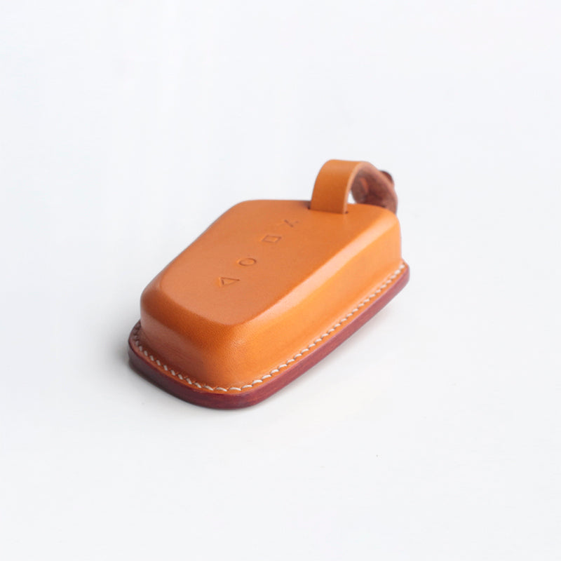 Precision molded leather cover for BMW fobs