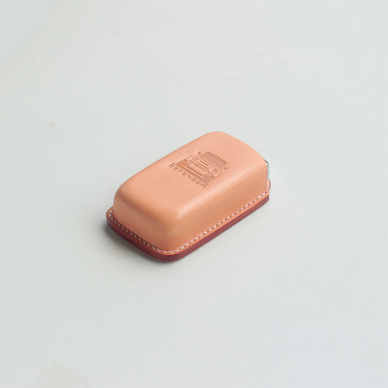 Close-up of genuine leather texture on Defender key cover
