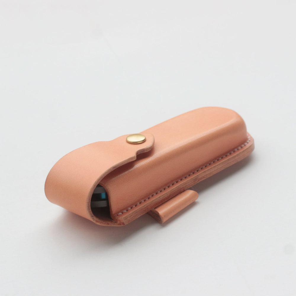Full-grain leather sheath molding to Chris Reeve Sebenza 31 contours